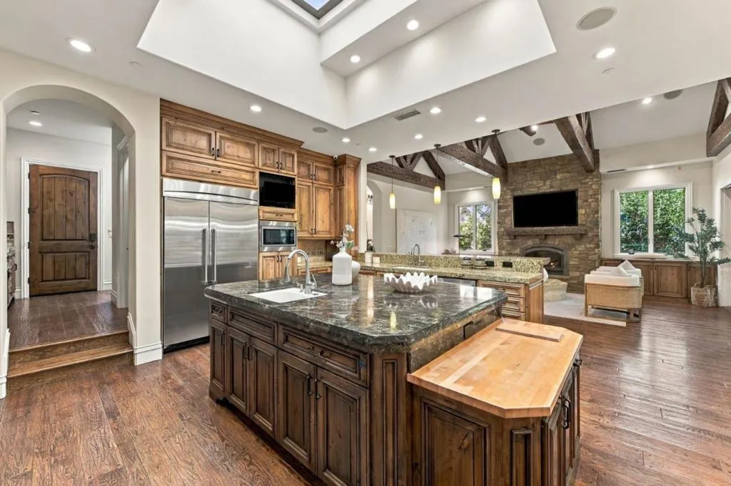 Chef kitchen with stainless refrigerator and butcher-block island, Los Gatos Chef kitchen with stainless refrigerator and butcher-block island, Los Gatos