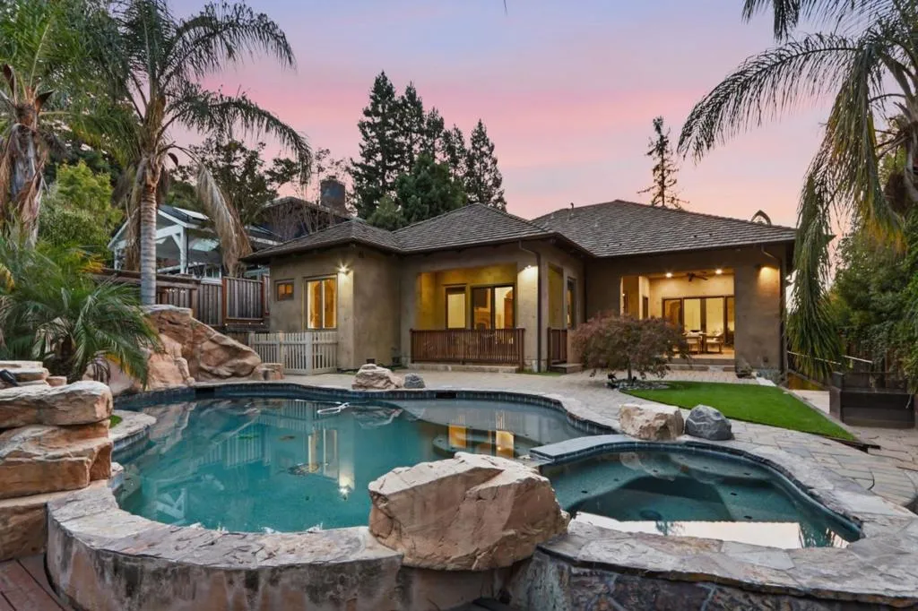 Pool and spa with the home lit at dusk, Los Gatos Pool and spa with the home lit at dusk, Los Gatos