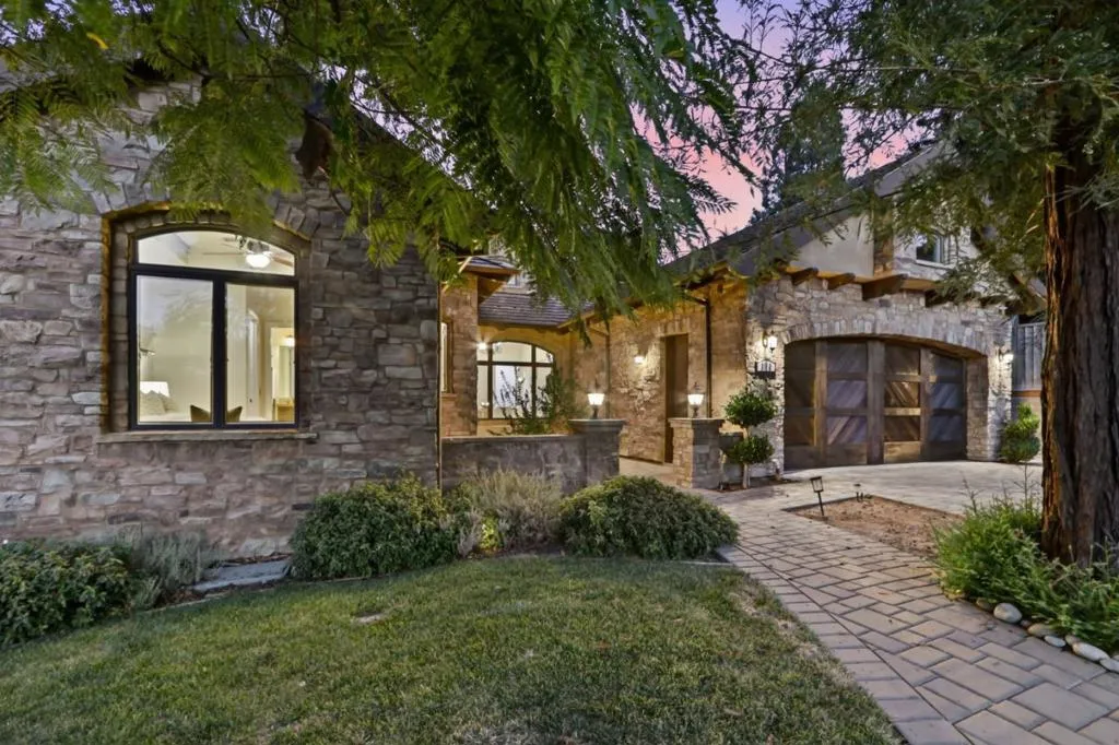Front lawn and stone window detail at twilight, Los Gatos Front lawn and stone window detail at twilight, Los Gatos