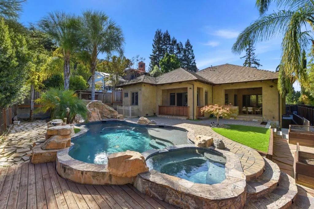 Pool, spa and rear of the home under blue sky, Los Gatos Pool, spa and rear of the home under blue sky, Los Gatos