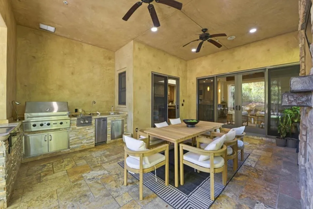 Loggia outdoor kitchen and dining table with ceiling fans, Los Gatos Loggia outdoor kitchen and dining table with ceiling fans, Los Gatos