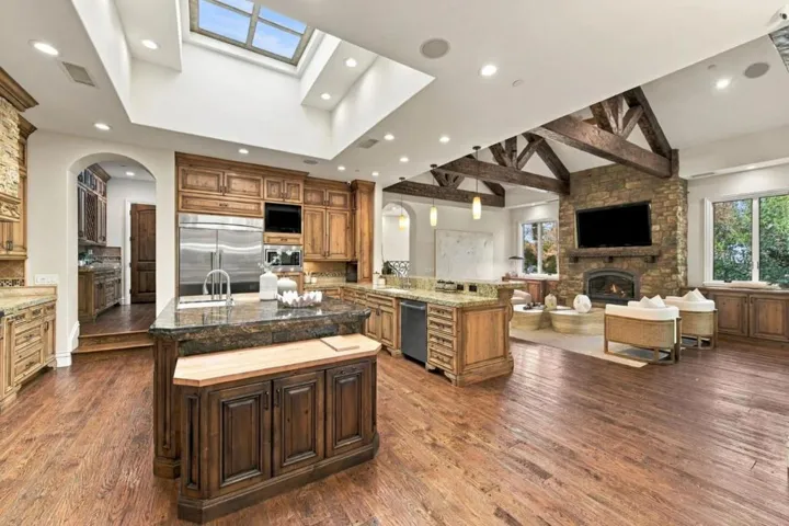 Kitchen island with skylights, built-in refrigerator and TV, Los Gatos