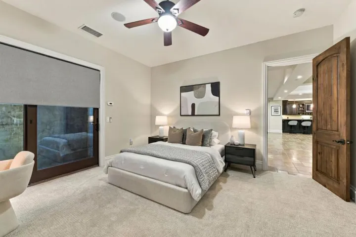Spacious bedroom with ceiling fan and neutral decor, Los Gatos