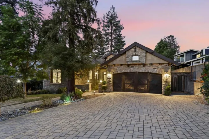 Garage and driveway lit at twilight, Los Gatos