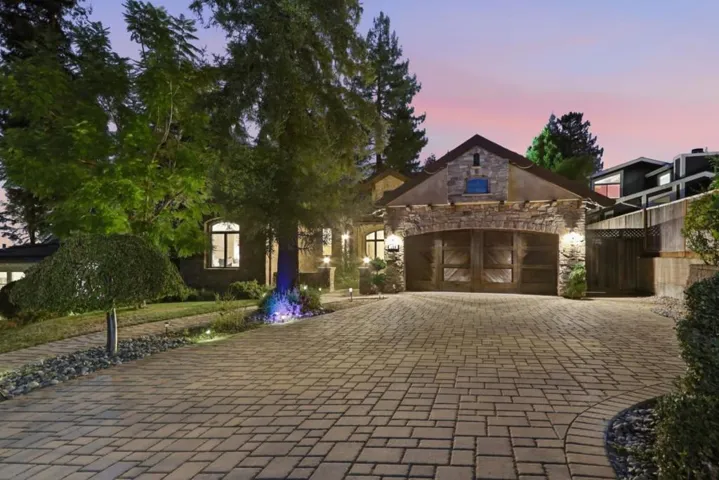 Paver motor court and garage at dusk, Los Gatos