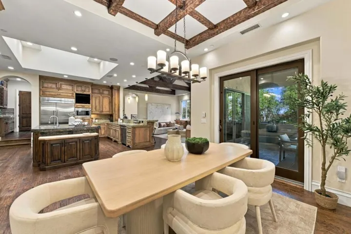 Breakfast nook with wood table and French doors to the patio, Los Gatos