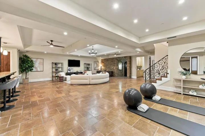 Basement fitness and flex space with stone floors and tray ceiling, Los Gatos