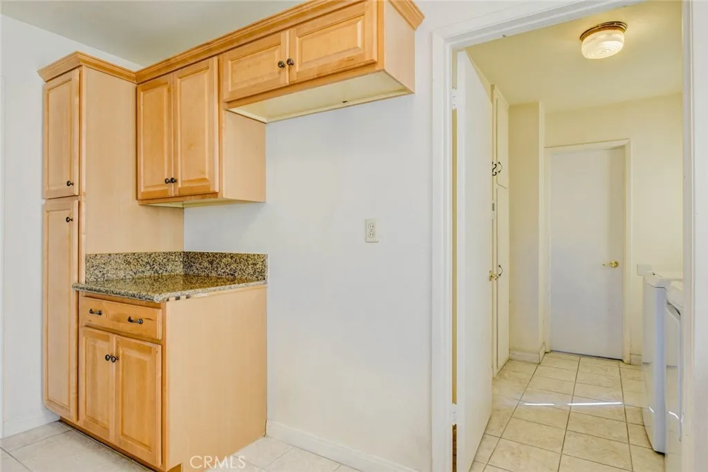 Water line to refrigerator was removed digitally.