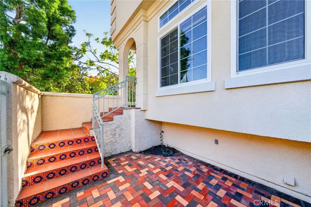 Front Brick Patio and Tile Stair Entry