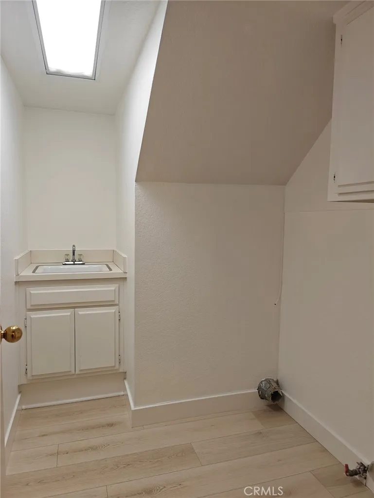 Laundry room with sink