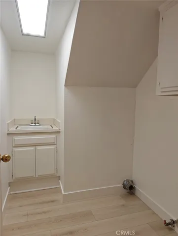Laundry room with sink