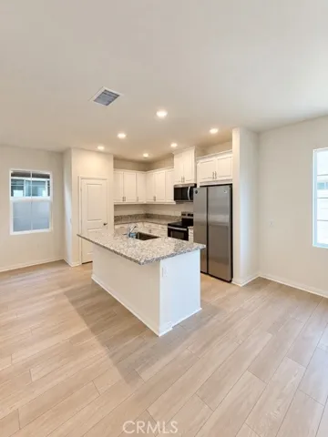 KITCHEN AND OPEN SIDE SPACE