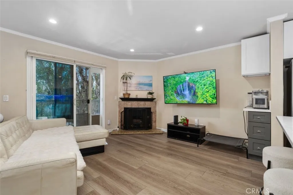 Living Room View 3 - This space features a gas fireplace and sliders that lead to balcony overlooking Recreation Park Golf Course! Living Room View 3 - This space features a gas fireplace and sliders that lead to balcony overlooking Recreation Park Golf Course!