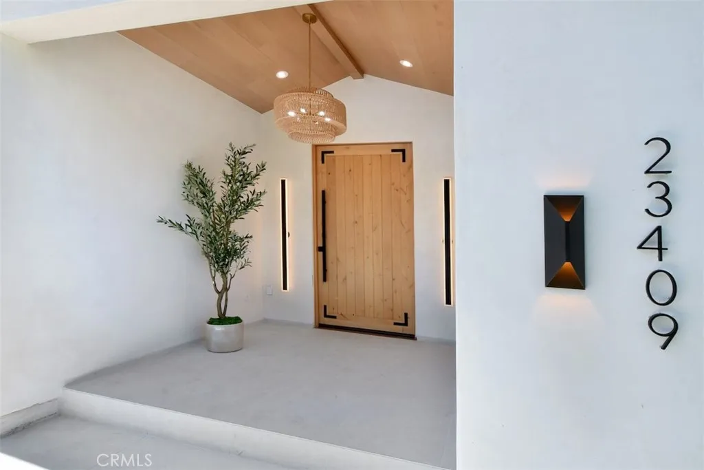 Front entrance porch featuring the stylish doorway, address numbers, and surrounding exterior detail. Front entrance porch featuring the stylish doorway, address numbers, and surrounding exterior detail.