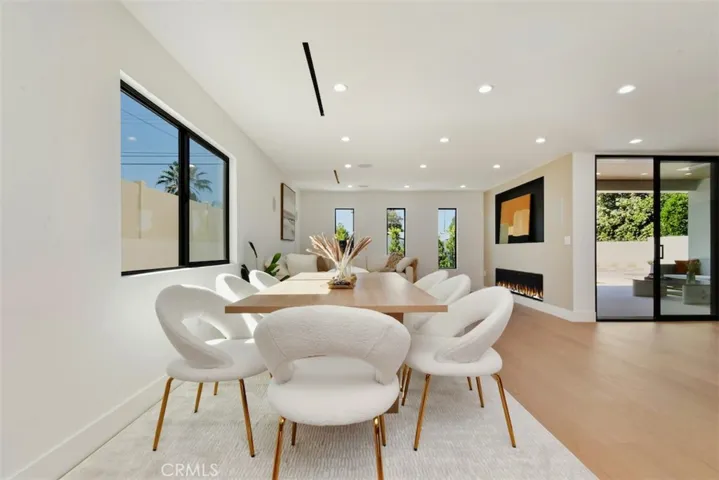 Additional angle of the central living and dining quarters, accentuating the seamless flow and spacious interior layout.