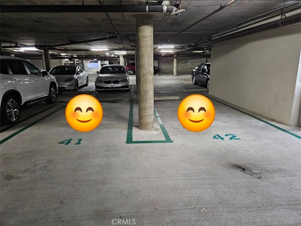 Side by side covered garage parking.