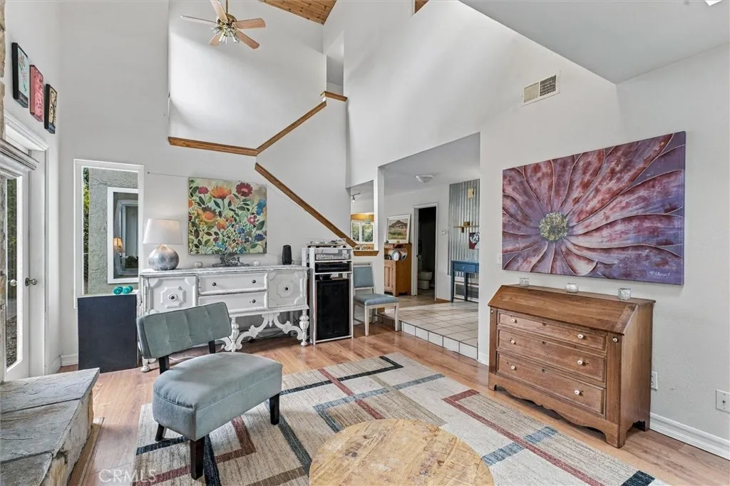 Vaulted wood ceilings add to the drama of this charming home Vaulted wood ceilings add to the drama of this charming home
