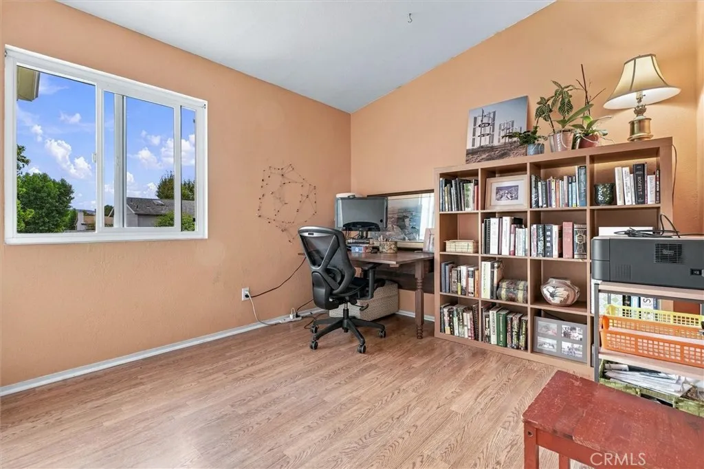 Another guest bedroom, also facing the back yard. This room is currently used as an office. Another guest bedroom, also facing the back yard. This room is currently used as an office.