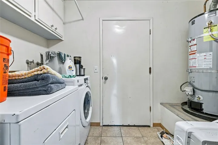 The laundry room is just off the two car garage.