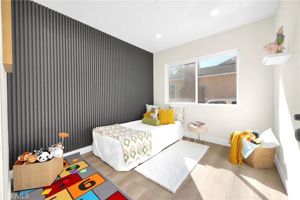 Contemporary style panelling, light colors and newer flooring.