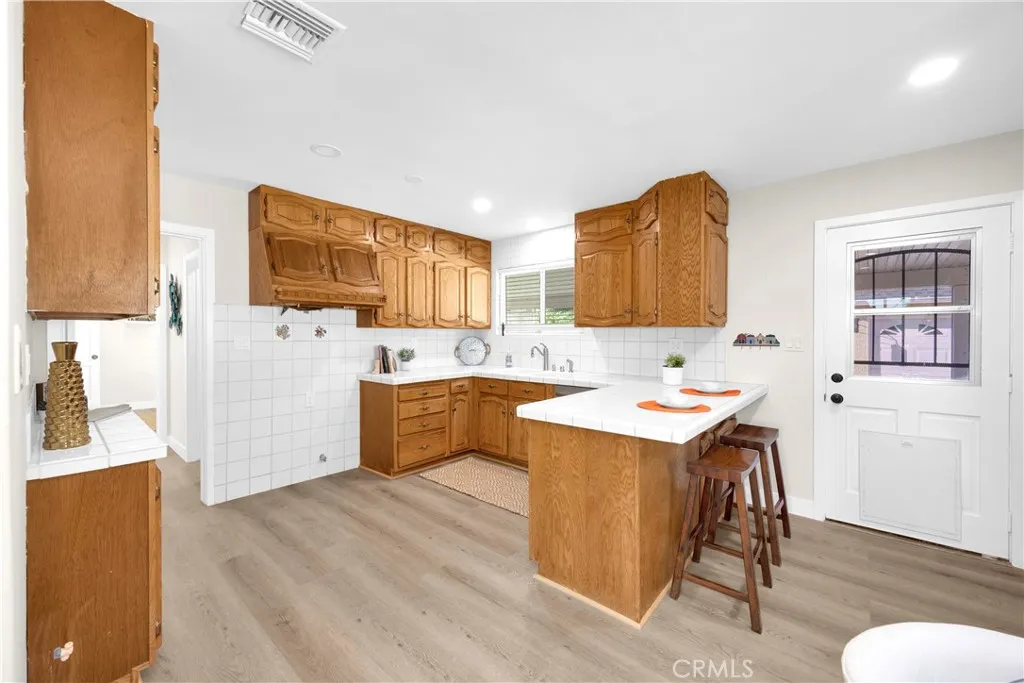 Kitchen feels spacious and the breakfast bar opens up the space beautifully!