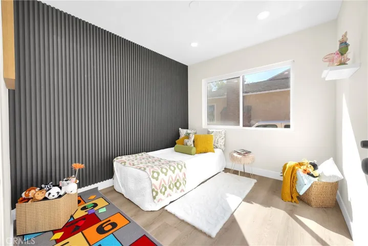 Contemporary style panelling, light colors and newer flooring.