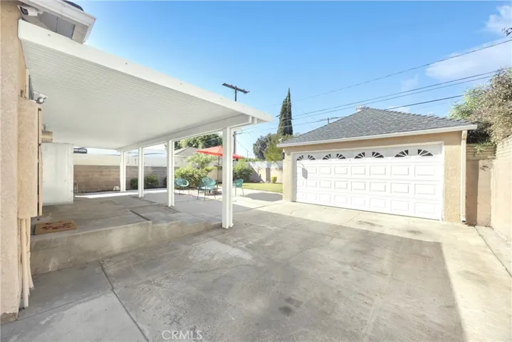 Long Drive way that leads to your Two-Car Garage.