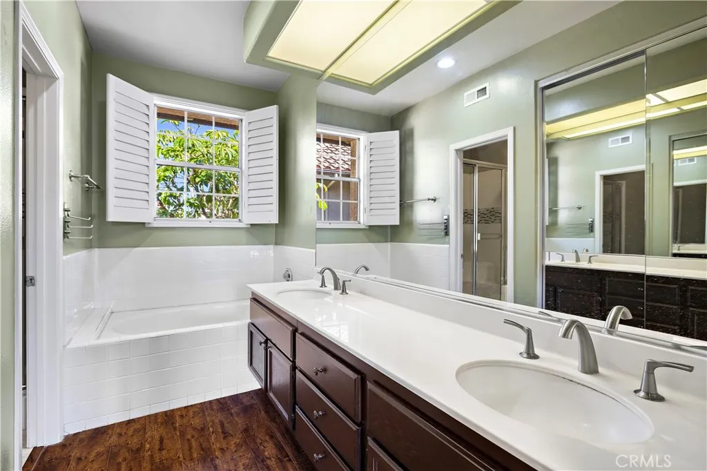 Primary Bathroom with two sinks and soaking tub. Primary Bathroom with two sinks and soaking tub.
