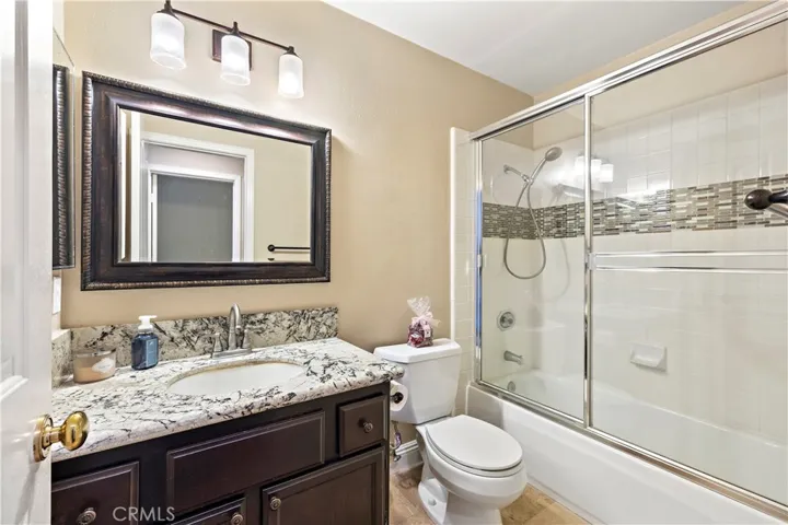 Downstairs full bathroom adjacent to bedroom
