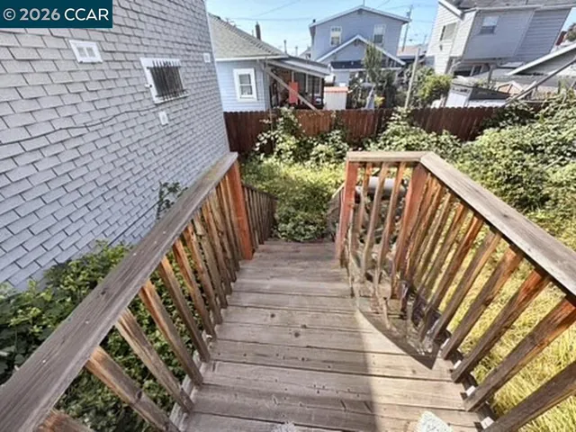 Rear deck. Digitally altered: personal property and debris removed. Unaltered photo available.