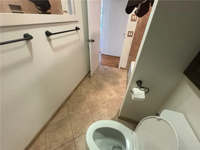 Bathroom looking toward hallway and living room