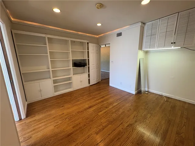 Reading room, foyer through door, kitchen along left wall