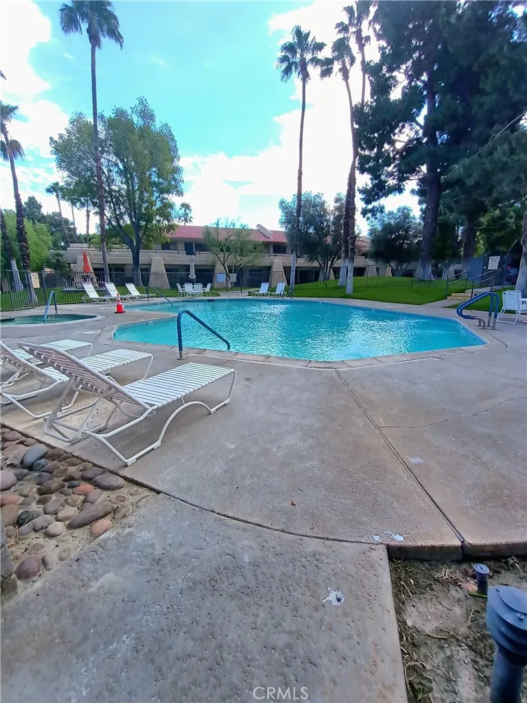 Pool on the backside of the building Pool on the backside of the building