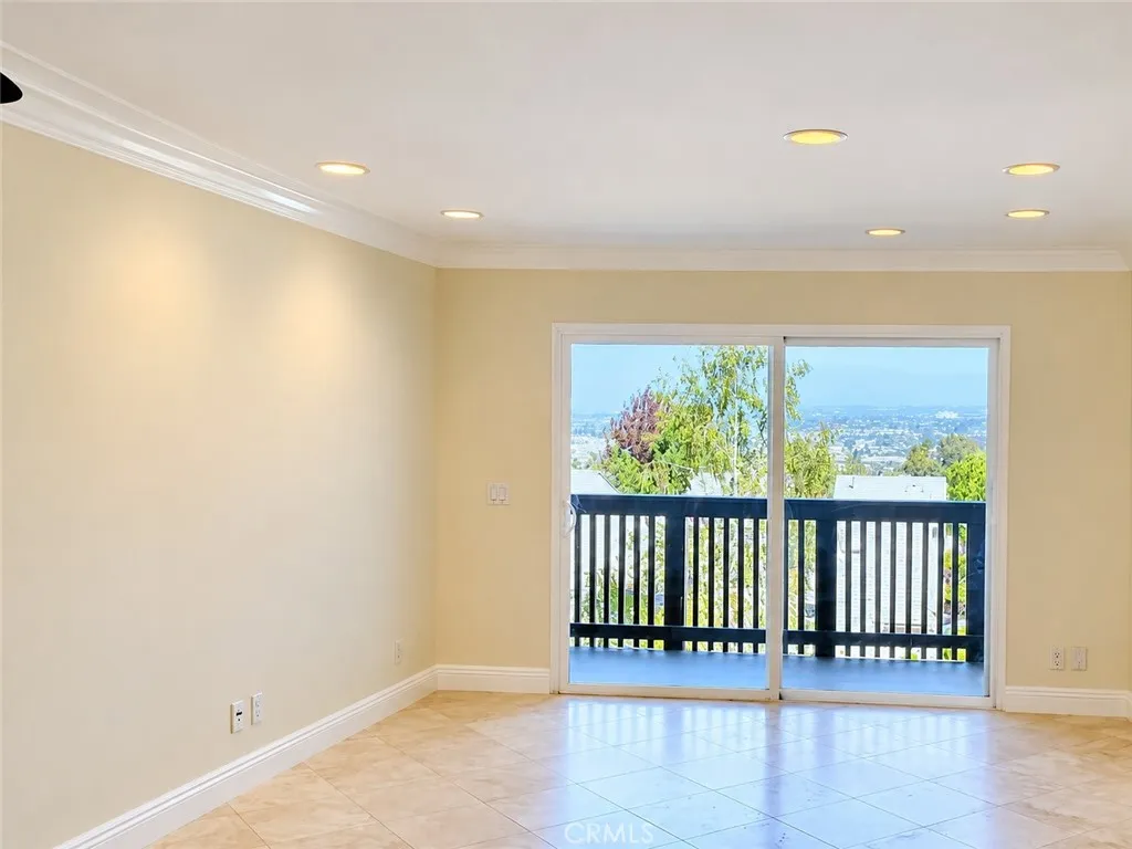 Spacious living room with travertine floors