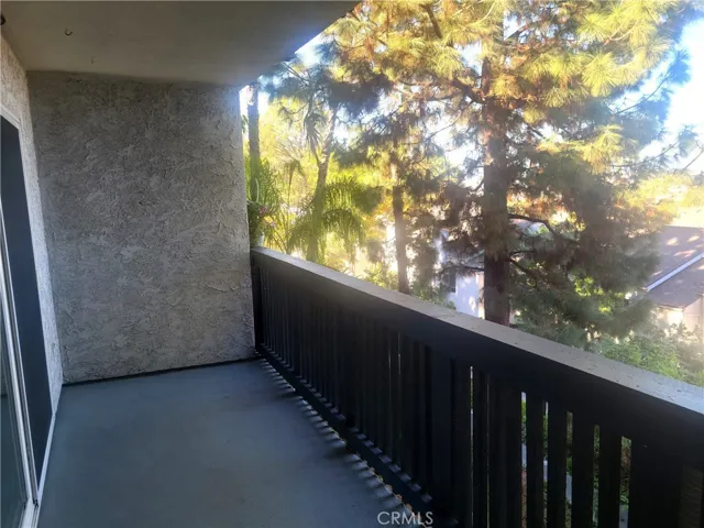 Private and peaceful covered balcony runs the length if the unit