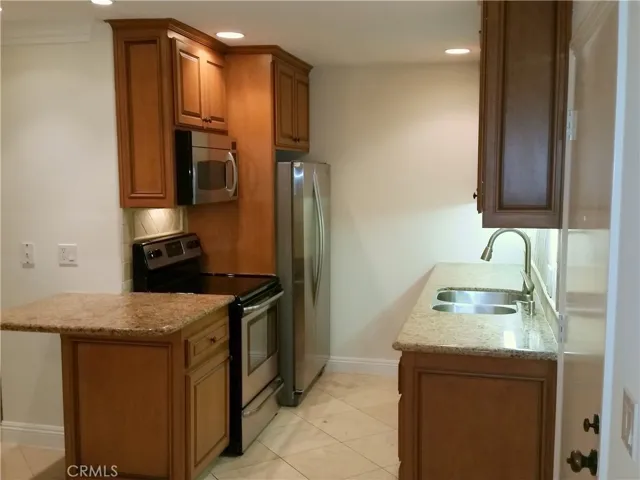 Stunning kitchen with cherry wood cabinetry