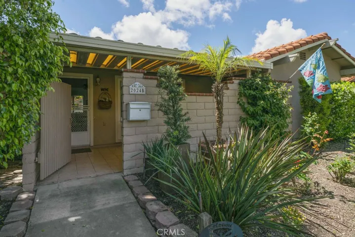 Peaceful and tranquil San Sebastian model, beautifully landscaped with private patio entrance!