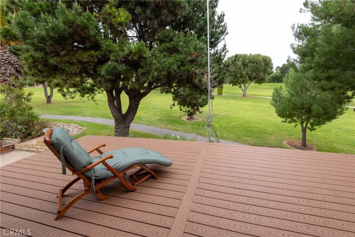 Outdoor Patio Space is One-of-a-Kind: Home features Outdoor Patio Space w/newly installed Trex deck (low maintenance) and Large Wrap Around Yard w/Private Entry to the Golf Course