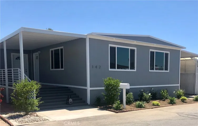 DREAMS COME TRUE IN THIS FLAWLESS THREE BEDROOM 2 BATH PLUS SEPARATE OFFICE/DEN with very Low Space Rent of 875 which includes the water. All Ages Rent Controlled Community