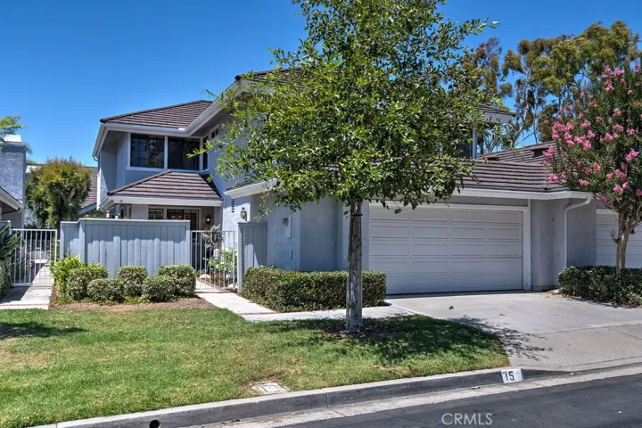 Well located town home with real front yard and generous driveway on one of Woodbridge's prettiest streets