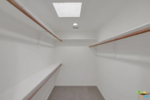 1 of 2 master walk-in closets