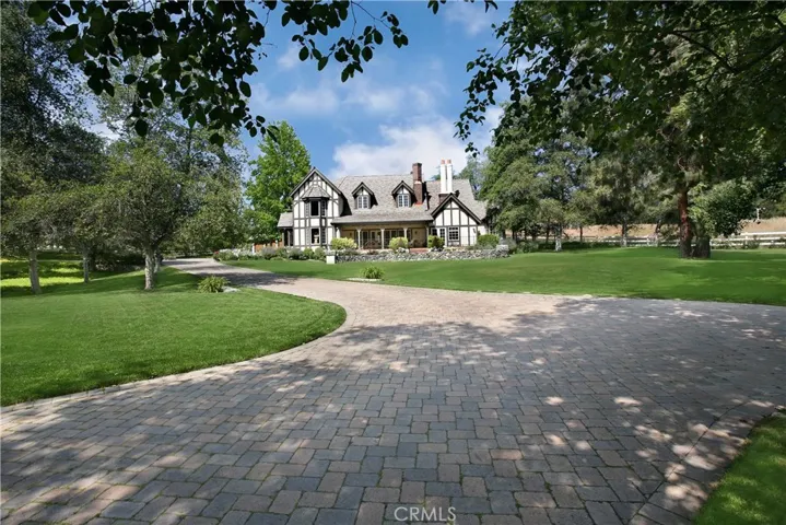 After entering a private gate, this long driving path leads you to main house