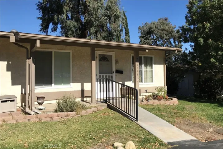 Welcome to 26379 Oak Highland Dr #A, Newhall ... a lovely single-story home with wonderful surrounding greenery.