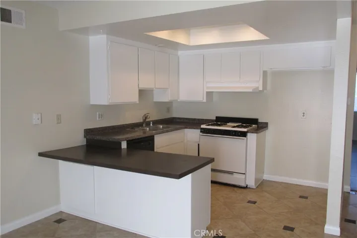 Bright Kitchen W/ New Flooring