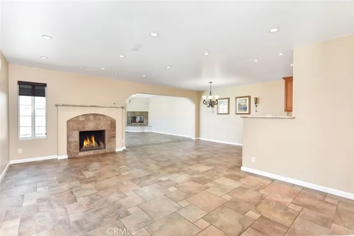 From the entry you enter to the living room. Dining room in the distant right