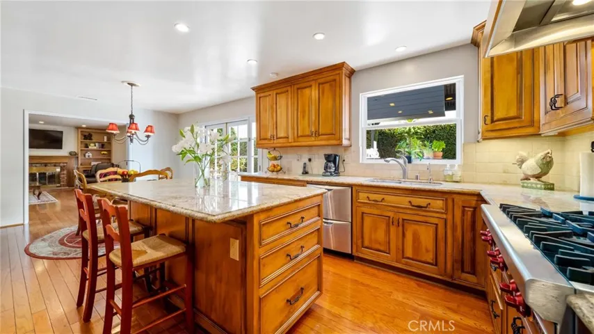 Room for everyone and everything in gorgeous custom kitchen guaranteed to suite the fussiest cooks.