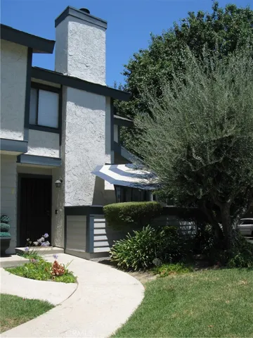 Front Entrance facing South with Patio