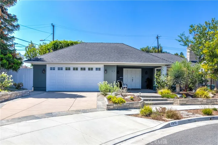Beautiful curb appeal located at the end of the cul-de-sac with a large covered front porch.