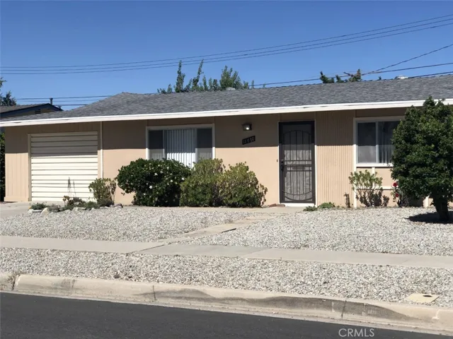 FRONT OF HOME WITH EASY CARE YARD