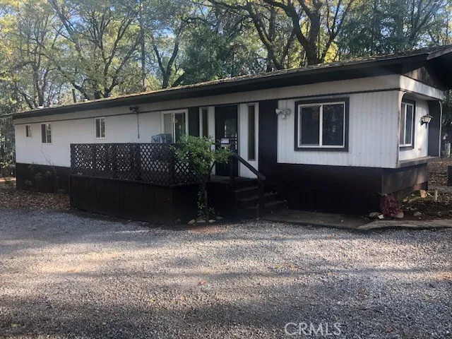 Welcome home to your single wide beautifully kept just under 1 acre property